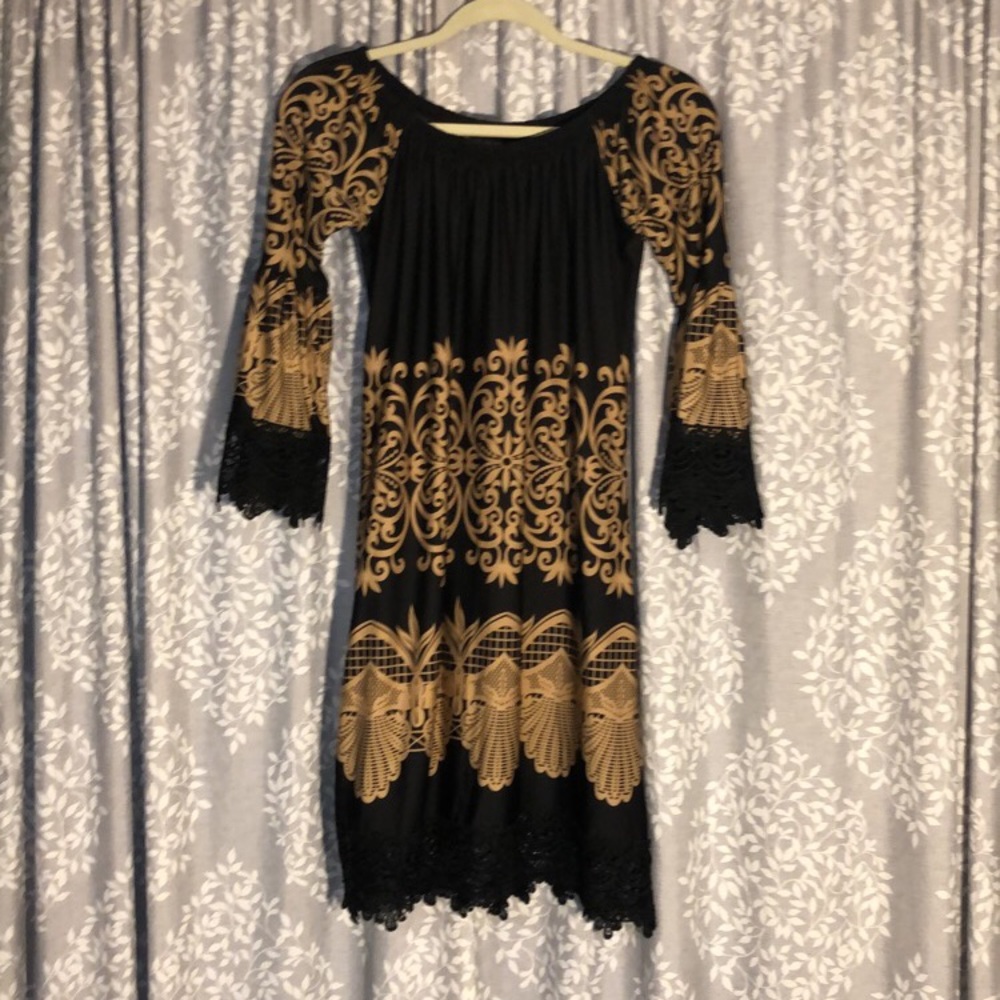 Black dress with a brown pattern